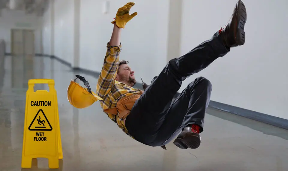 A photo of a worker slipping and falling.