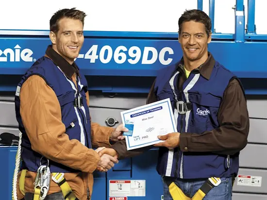 A photo of an individual receiving a Certificate of Training.